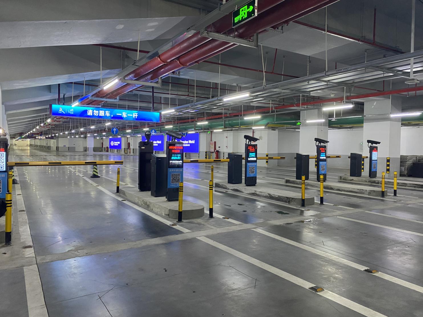 LPR parking lanes and smart barrier gates installed in a large exhibition center garage