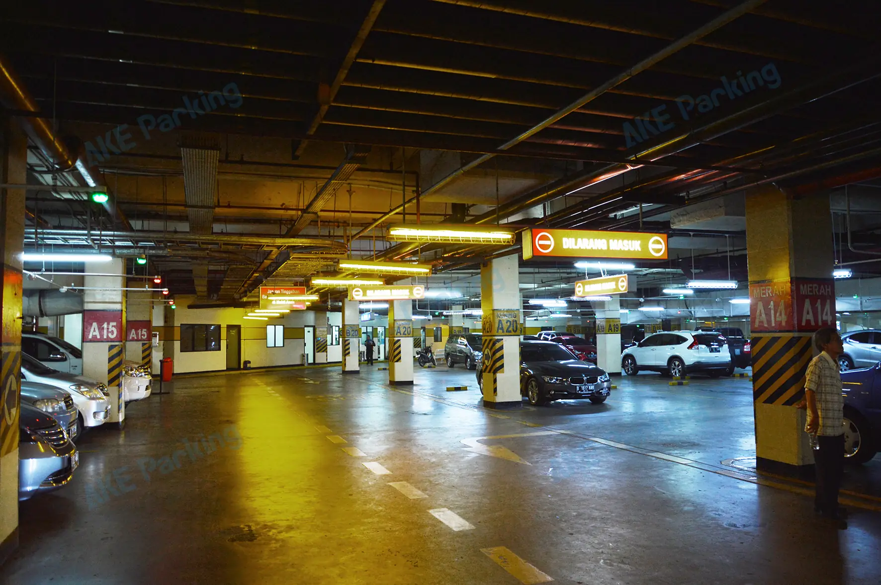 Parking aisles, bay indicators and directional signs in the Pondok Indah project archive.